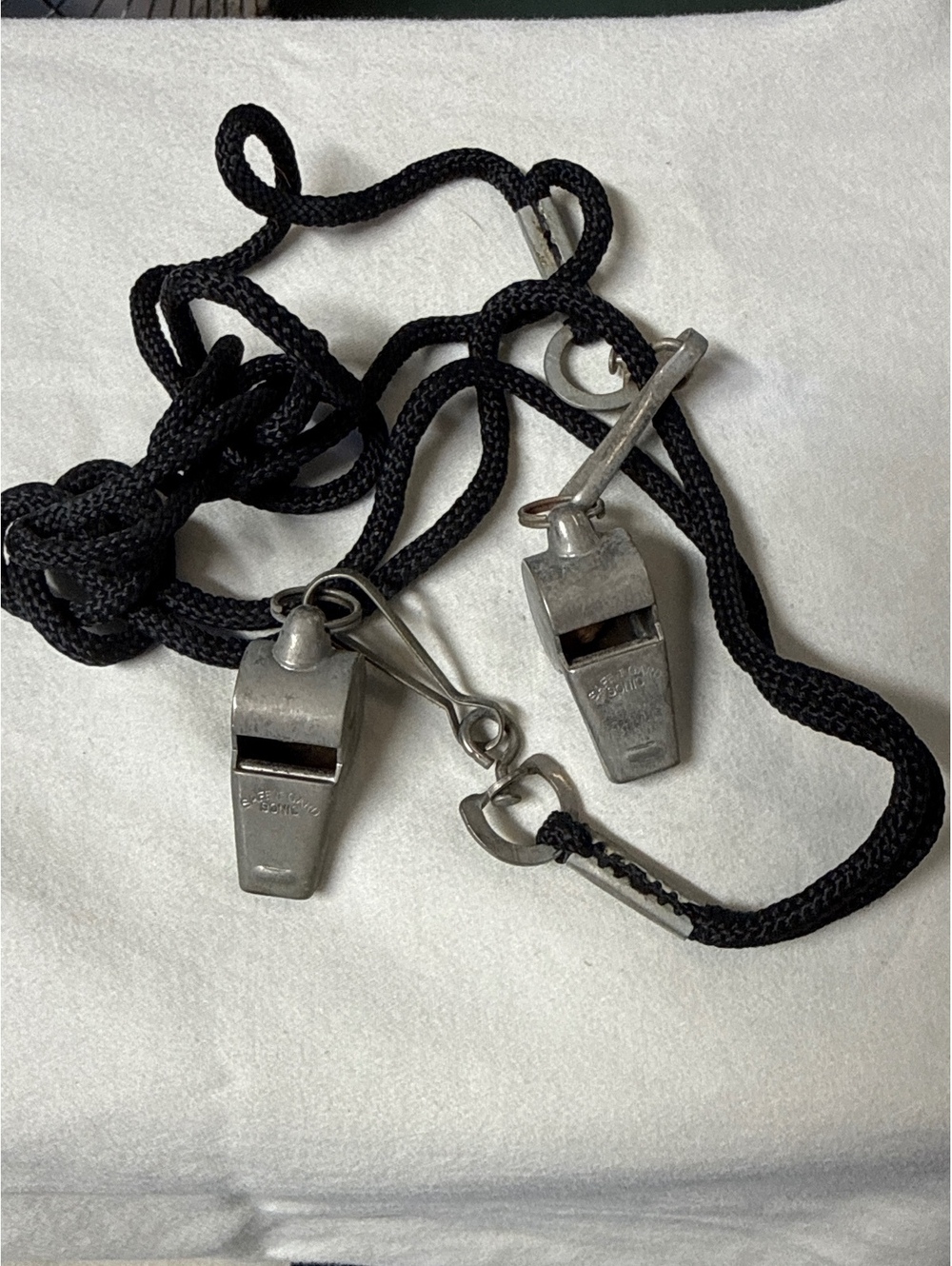 Vintage Safeguard Sonic Metal Whistles with Black Lanyard